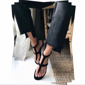 Pons Quintana black flat sandals.